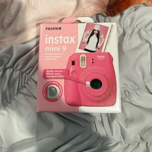 pink polaroid camera